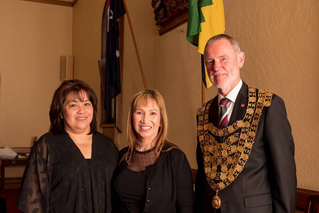 Ella Dixon, migration agent Josie Wallace and former Launceston mayor Albert van Zetten at a function to mark the 40th anniversary of Migrant Resource Centre Northern Tasmania. Picture by Phillip Biggs