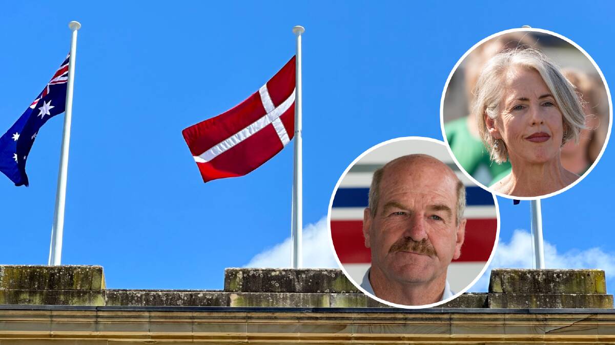 The Danish flag on the Tasmanian state parliament. Greens leader Rosalie Woodruff and Speaker Mark Shelton. Picture supplied/Craig George/Phillip Biggs. 