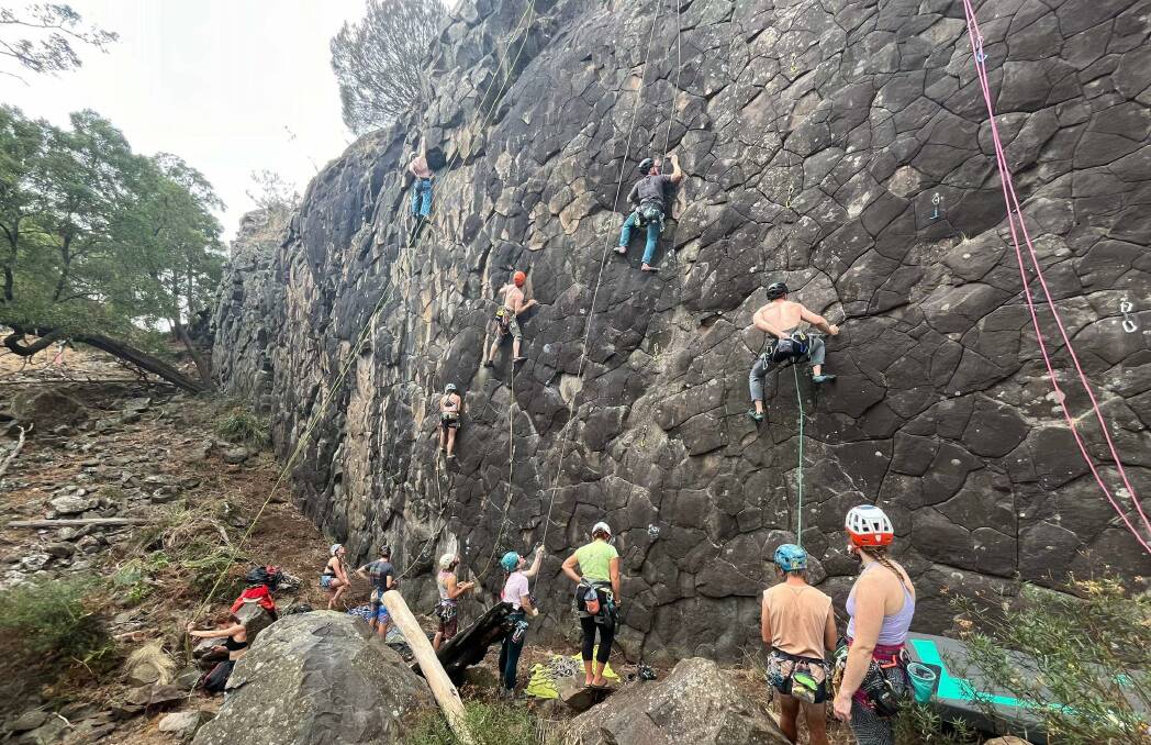 Climbers tackle a rock wall on reopening day at Hillwood. Picture supplied by Doug Grubert