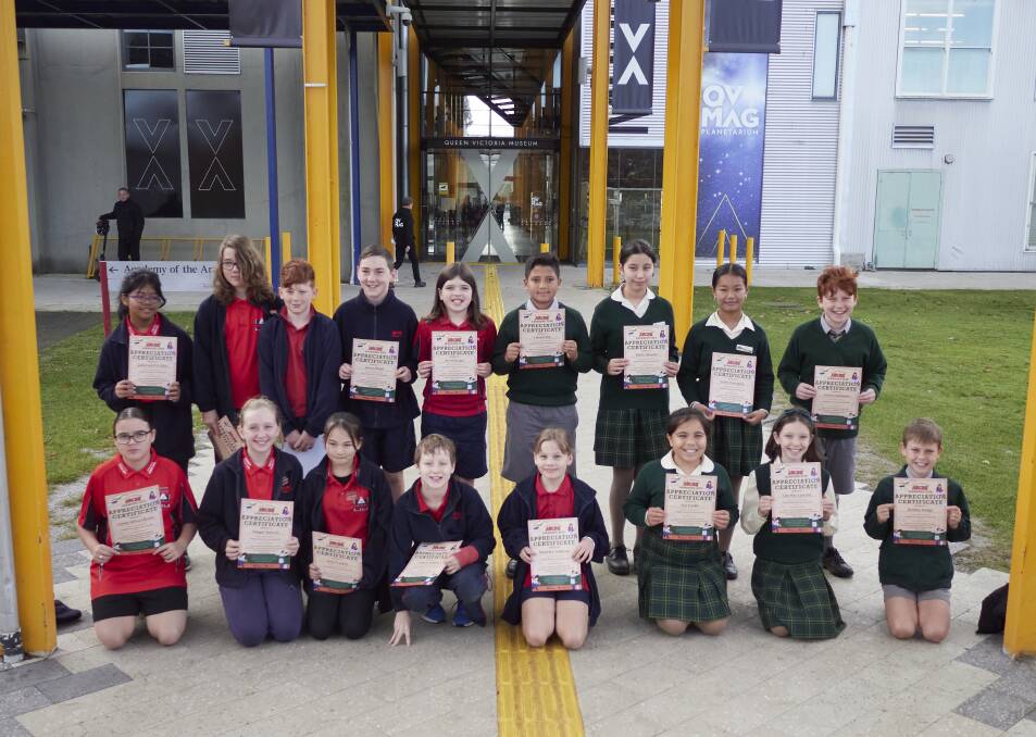 Invermay and St Finn Barr's Catholic Primary School students with certificates of appreciation after the debut of their short film. Photo by Rod Thompson