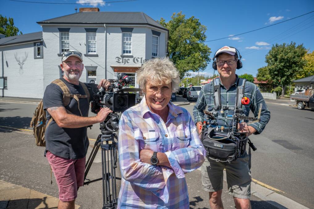 ABC Back Roads host Heather Ewart with cameraman Aaron Kelly and sound recordist Terry Chadwick outside the Clarendon Arms in Evandale. Picture by Paul Scambler