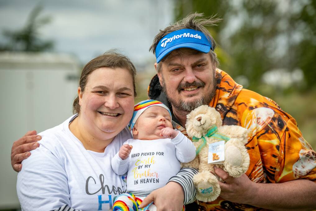 Nicole and Andrew Perry with their 10 week old son, Emmett, at the Choosing Hope walk at Riverbend park. Picture by Paul Scambler