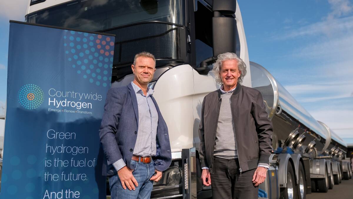 Countrywide managing director Geoffrey Drucker and 7R managing director Tim Jensen announce a hydrogen truck fleet at Launceston airport. Photo: Declan Durrant 