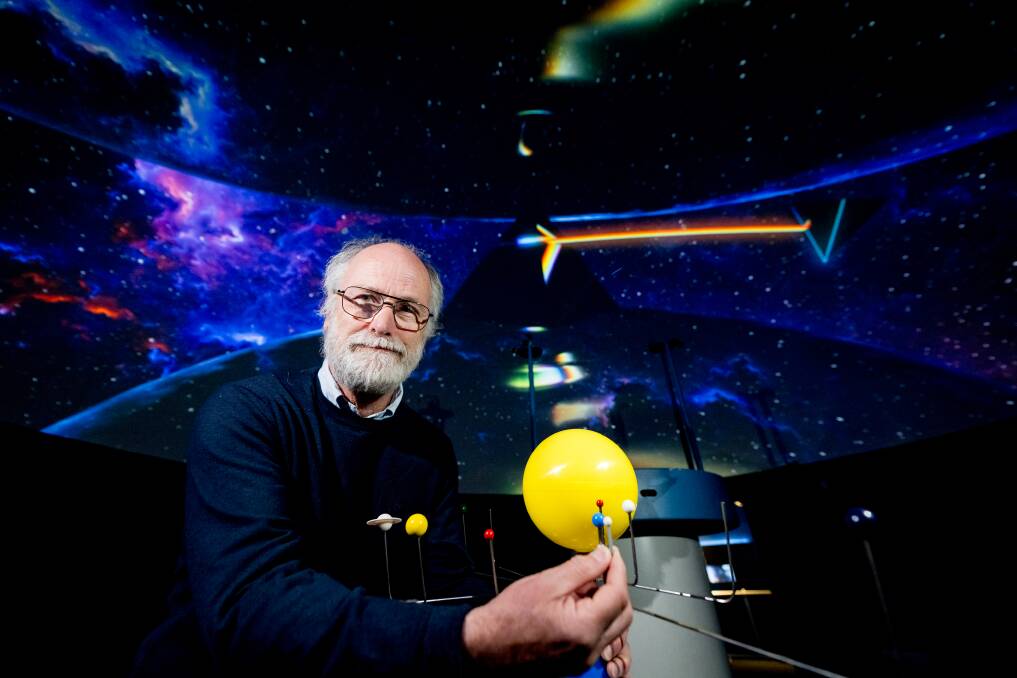 Planetarium senior officer Chris Arkless at the Pink Floyd Dark Side of the Moon show at Launceston Planetarium. Picture by Phillip Biggs