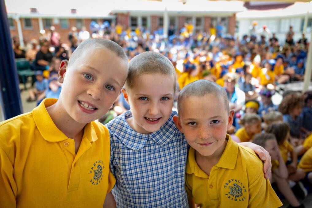 Lloyd Young, 8, Amelia Lee, 7, and Darcy French, 7, shaved off their hair to raise money for CanTeen Australia at Trevallyn Primary School. Picture by Paul Scambler