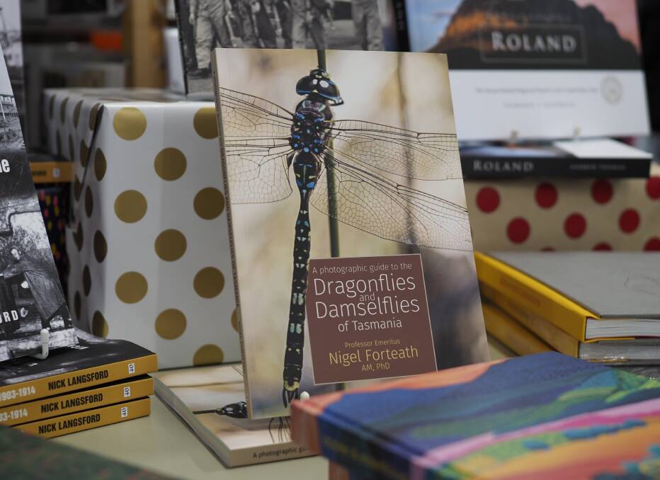 Professor Forteath's latest publication, 'A photographic guide to the dragonflies and damselflies of Tasmania' is available in Petrarch's Bookshop. Picture by Annika Rhoades