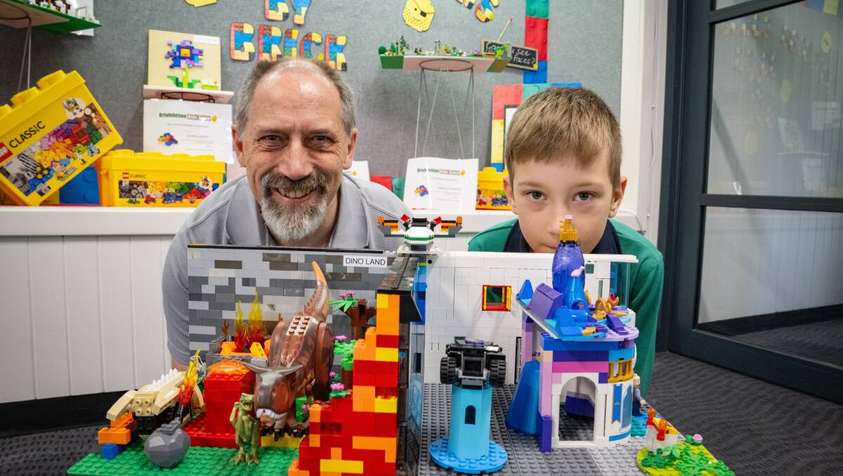 Brixhibition coordinator Ken Draeger with William Collins at Norwood Primary School with William's award winning Lego. Picture by Paul Scambler 