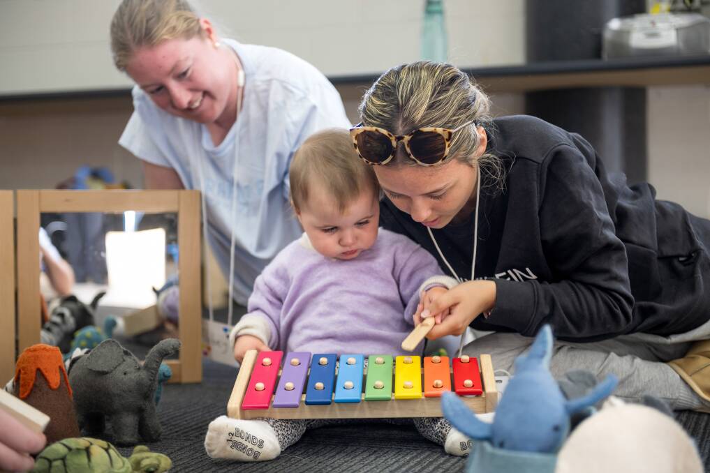 Abbey Chaple and Abby Lucas with baby Primsore Purton
at Launceston College playgroup. Picture by Phillip Biggs