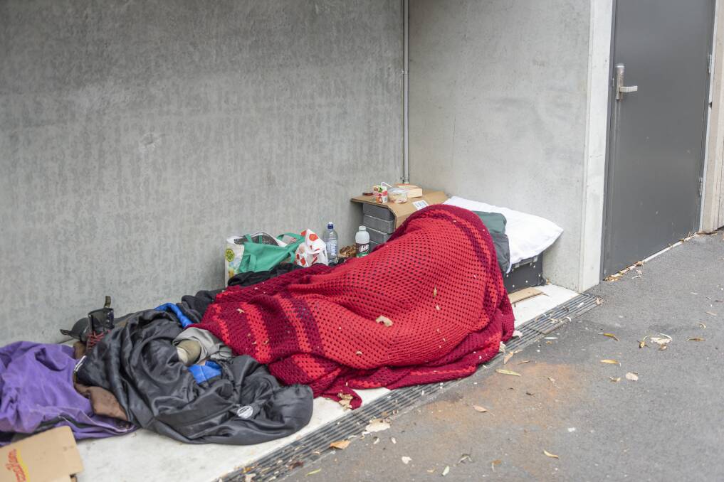 A homeless person sleeping rough in Launceston CBD. Picture: Craig George. 
