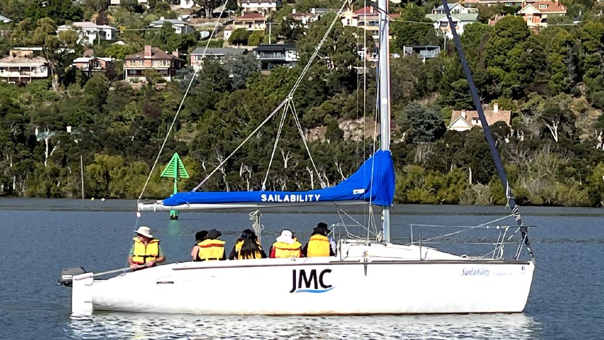 A Sailability Launceston yacht out on the water with participants. Picture supplied.