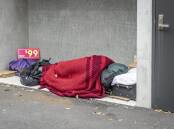 A homeless person sleeping rough in Launceston's CBD. Picture: Craig George. 