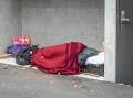 A homeless person sleeping rough in Launceston's CBD. Picture: Craig George. 