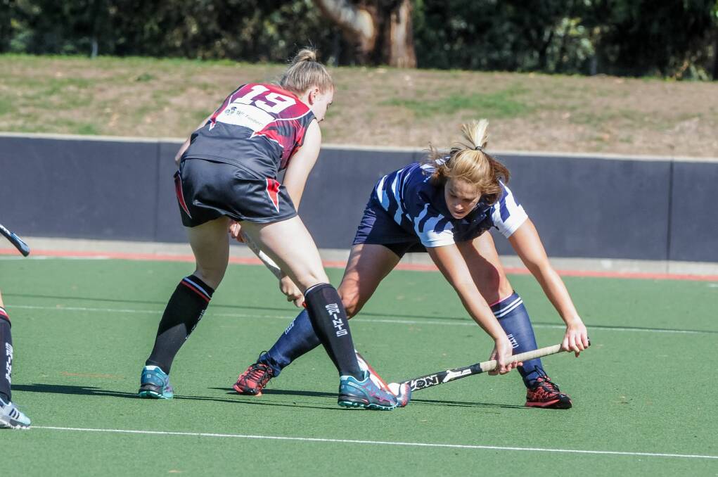 HIGH EXPECTATIONS: Smithton's No. 19 Abbey House battles her Launceston City opponent. Smithton faces City Marians this weekend and after a week off Smithton has no excuse. Picture: Neil Richardson.
