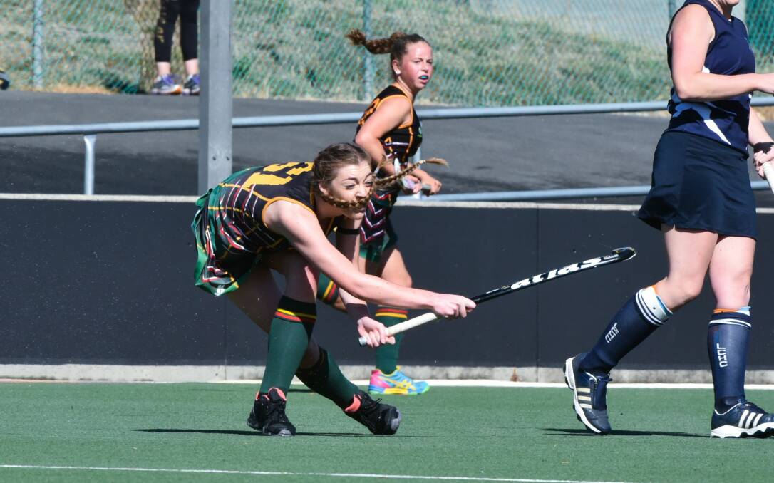 POWER: Tamar Churinga's Zoe Crawford smashes the ball away in a recent match against Launceston. Tamar meets West Devonport in Launceston this weekend. Picture: Neil Richardson