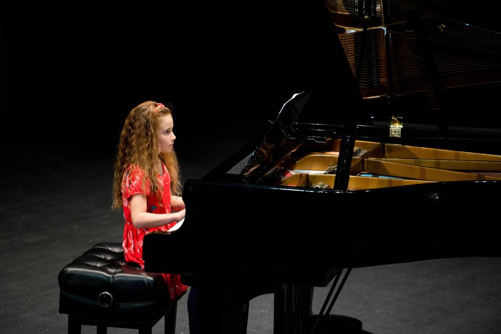 Sophie Brewster competing in the 8 and 9 years Modern Piano.