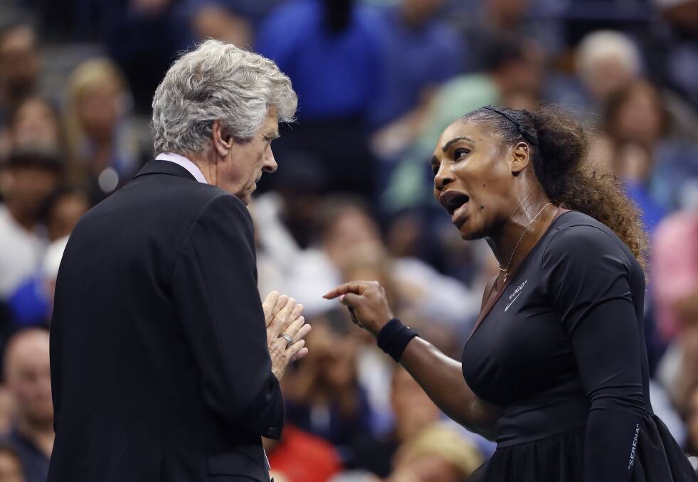 FAULT: Serena Williams talks heatedly with referee Brian Earley during the women's final of the U.S. Open tennis tournament against Naomi Osaka. The game was notable for her tempestuous behaviour. Picture: AP Photo/Adam Hunger