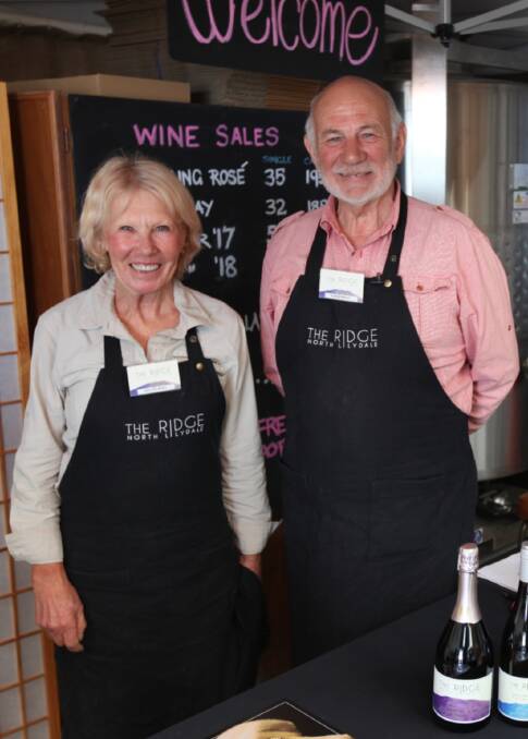 HOMECOMING: The Ridge's Sue Denny and Harry Rigney at their cellar door. Picture: Supplied.
