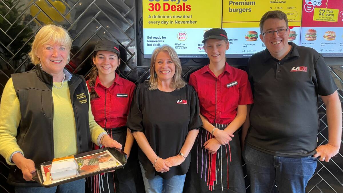 ALL SMILES: Rosemary Armitage celebrates McHappy Day with McDonald's staffers Nepheli Papavasileiou and Zoe Miller and Jules and Glenn from LAFM. Picture: Supplied