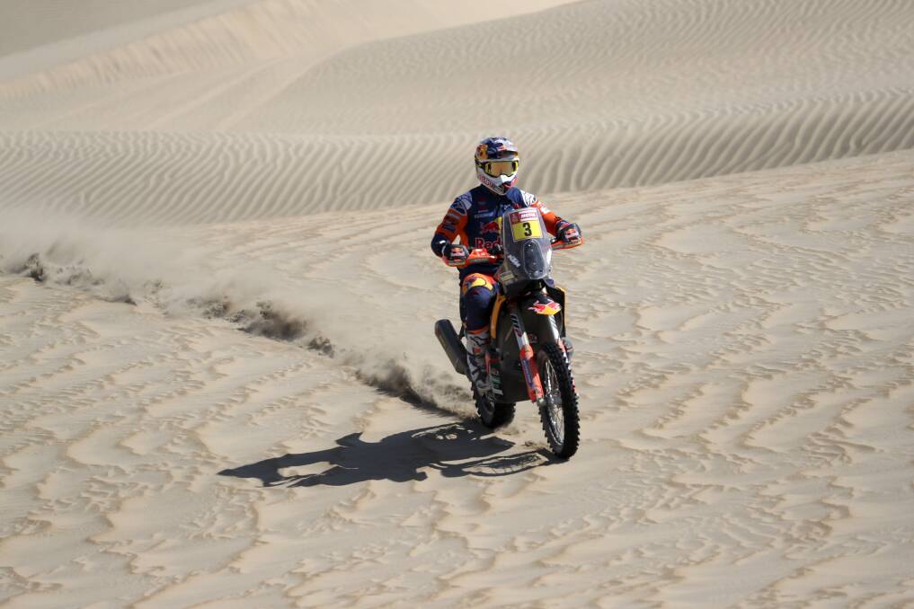 ENDURANCE: Toby Price of Australia on his KTM motorbike during stage seven of the Dakar Rally in San Juan de Marcona, Peru. Price completed the race and claimed victory, all with a fractured wrist. Picture: AP Photo/Ricardo Mazalan