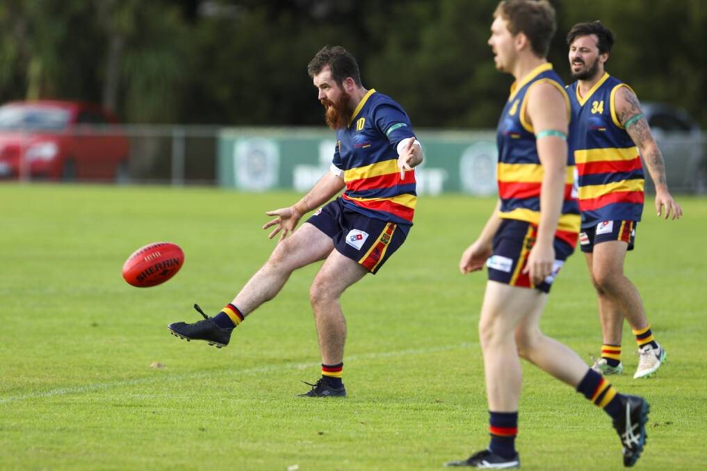 IN THE HUNT: East Ulverstone's Matt Thompson-Purton takes a punt. Despite the loss on Saturday they will still be in the elimination final.  Picture: Cordell Richardson. 