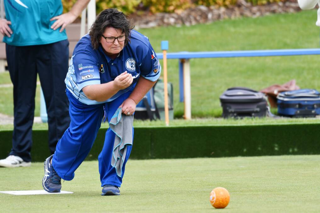 FOCUS: Penguin's Alison Venn guides her bowl down the green during the Premier League match between Penguin and Devonport. Picture: Brodie Weeding.
