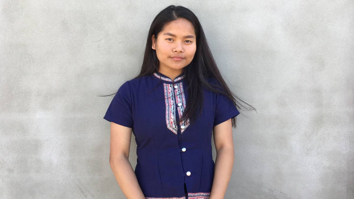 COMPLEX: Zodinpui Bunghma was born in Burma, but spent years in India before coming to Tasmania a decade ago so a seemingly-simple question can require a complicated answer.