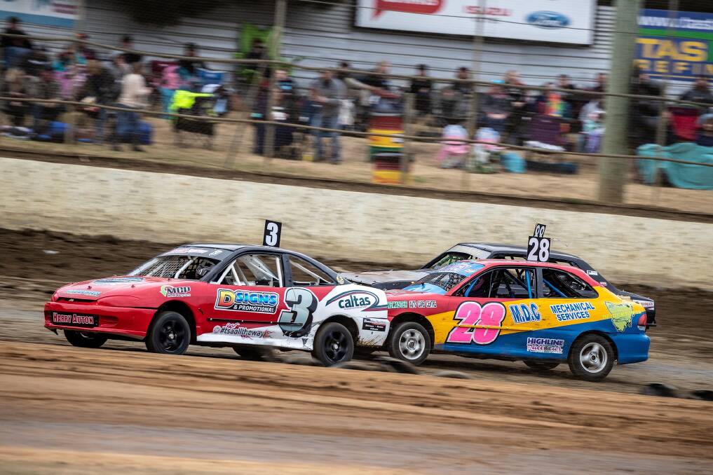 UP AND COMERS: Junior Top Star Harry Auton passes Karlia Riley in a recent race at Latrobe Speedway. Picture: Angryman Photography
