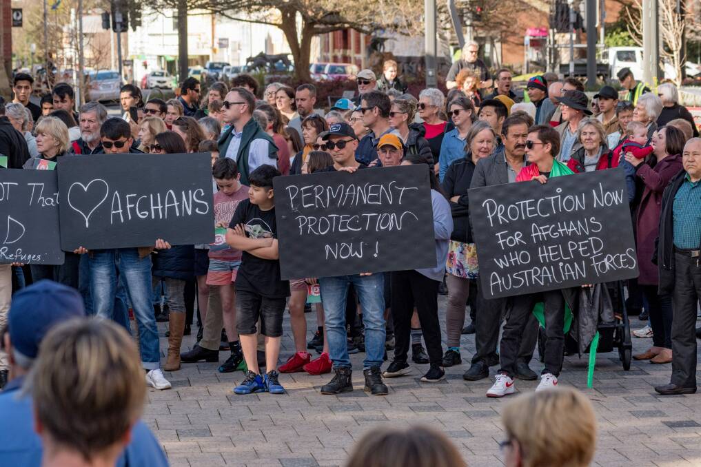 SUPPORT: At a recent rally, many came out to stand in solidarity with the Hazara residents of Launceston, to show that we are one family and their pain is felt by everyone. Picture: Phillip Biggs