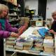 PAGE-TURNER: Volunteers Bev and Prue sorting books for the Library Book Sale. Preparations for the huge event take all year. Pictures: Friends of the Library, Launceston (FoLL)
