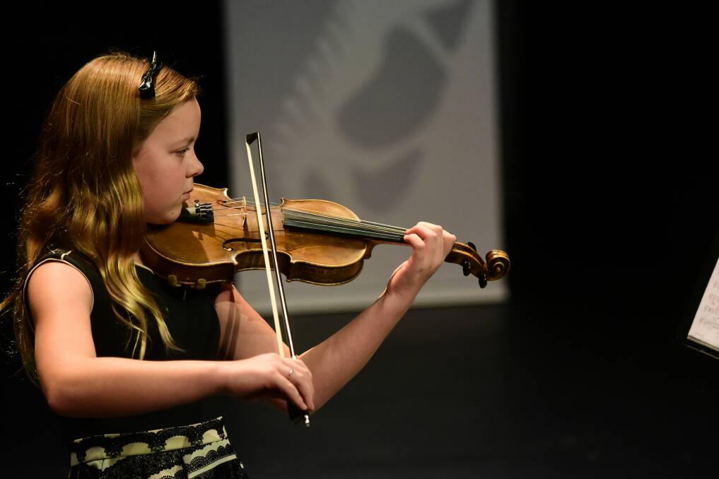 Micah Kenzie played in Class 137 Stringed Instruments.