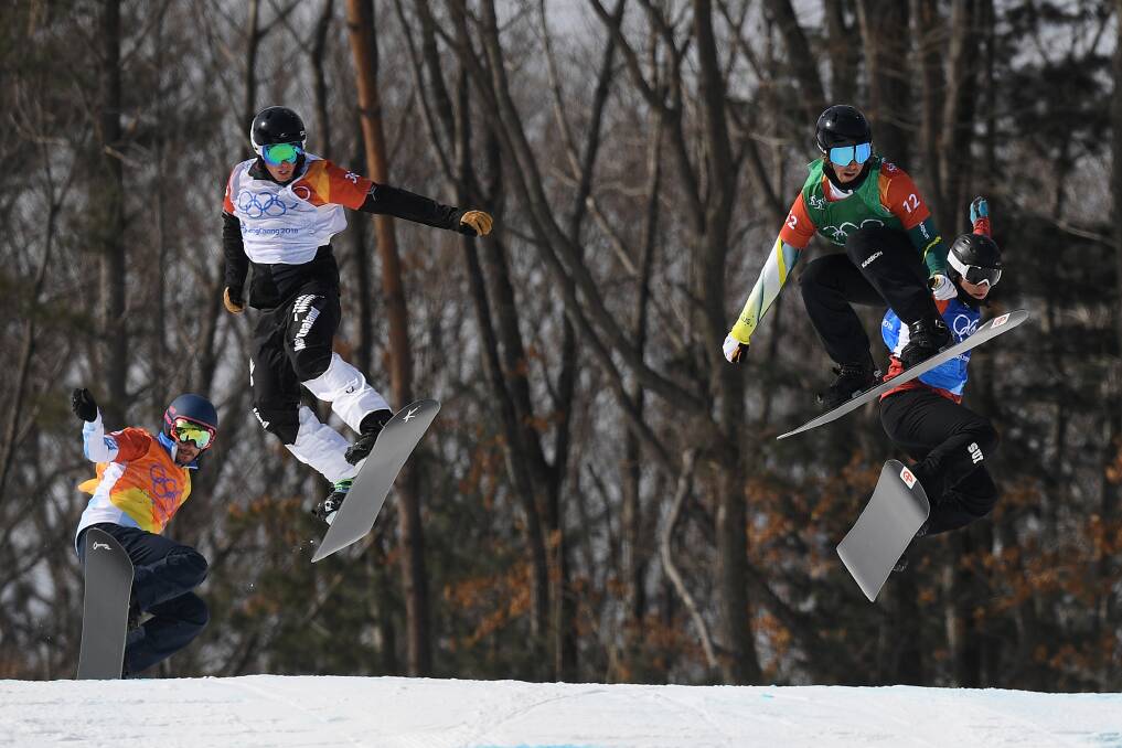 ON THE FLY: Australians have embraced new disciplines and are excelling. Here Aussie Cam Bolton  (second right) competes in the Men's Snowboard Cross in PyeongChang. Pictures: AAP Image/Dan Himbrechts 