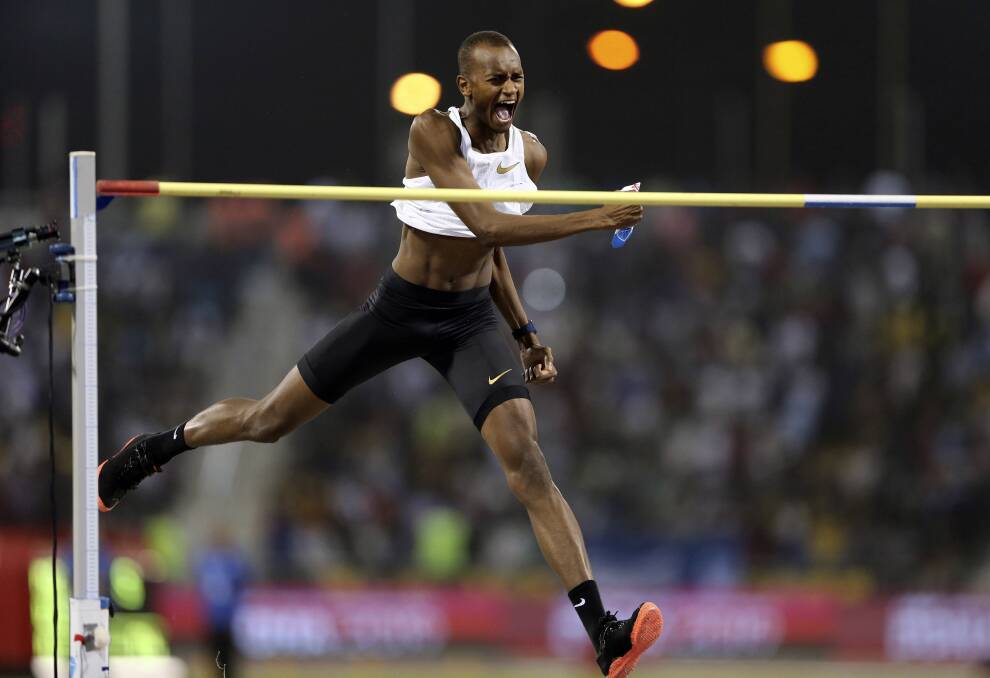 Qatar's Mutaz Essa Barshim celebrates after his high jump win during the Qatar Diamond League. Athletes compete for the same prize money regardless of gender.