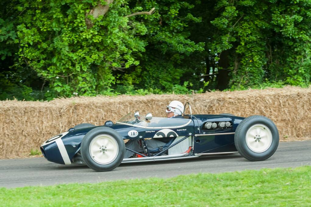 A DRIVER AND A GENTLEMAN: Sir Stirling Moss in his classic Lotus 18 Formula 1 car on the hill course at Goodwood in 2012, the site of the crash which brought his professional racing career to an end in 1962. He died on April 12.