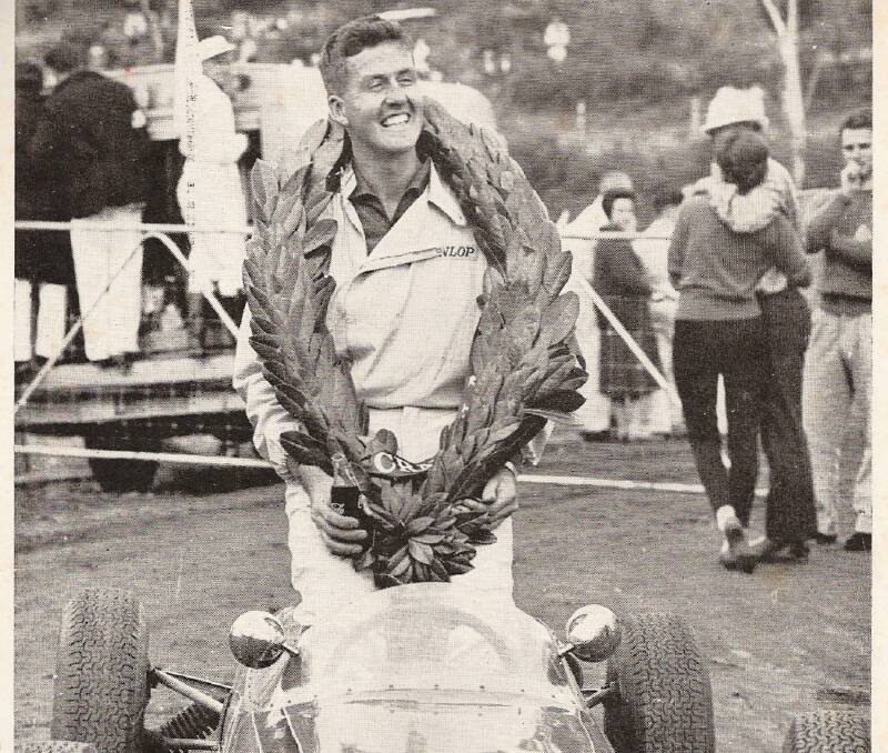 TASMANIAN TRIUMPH: Gavin Youl wearing his victory garland after winning the NSW Formula Junior Championship at Catalina circuit in Katoomba. He raced internationally with Jack Brabham's MRD team.