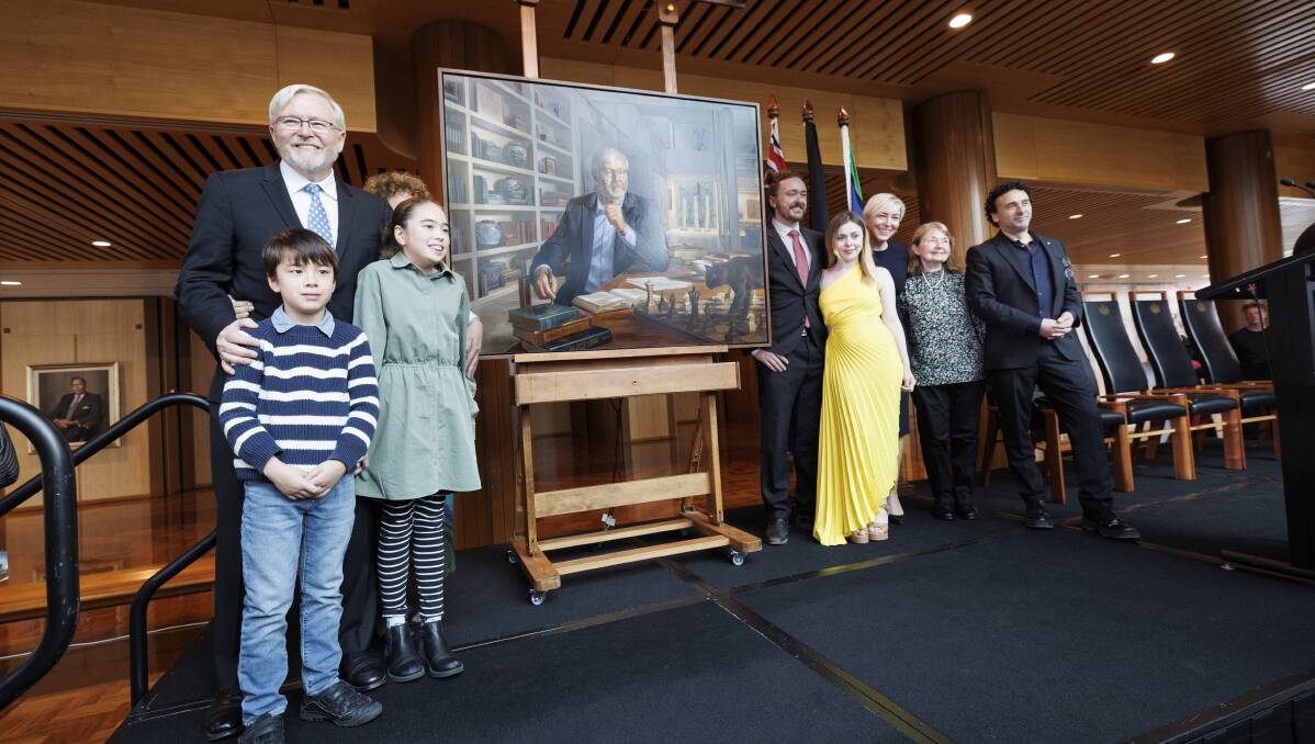 Former prime minister Kevin Rudd with his family at the portrait unveiling at Parliament House on Thursday including two of his three grandchildren and two of his three children Marcus and Jess (far right) and Marcus' partner Chloe in the yellow dress. Picture by Keegan Carroll