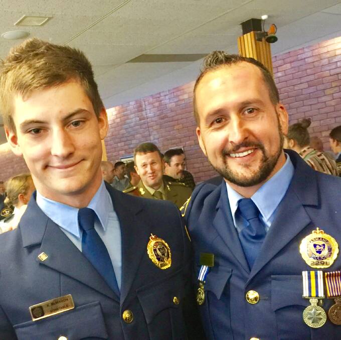 Constable Kyran McMahon with his brother, Acting Inspector Dean McMahon, at Friday's graduation ceremony at the Tasmania Police Academy. Picture: Supplied