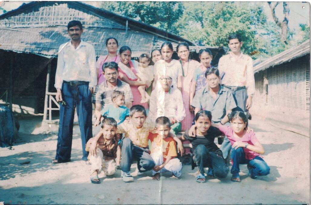 Yashoda as a child with her family in a refugee camp in Nepal. Picture: Supplied