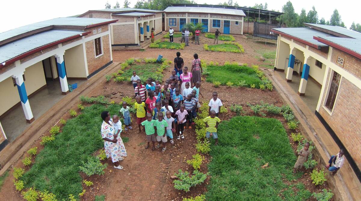 GIVING BACK: Launceston based organisation Villages of Life has seen the construction of homes and schools for families in Burundi, East Africa.