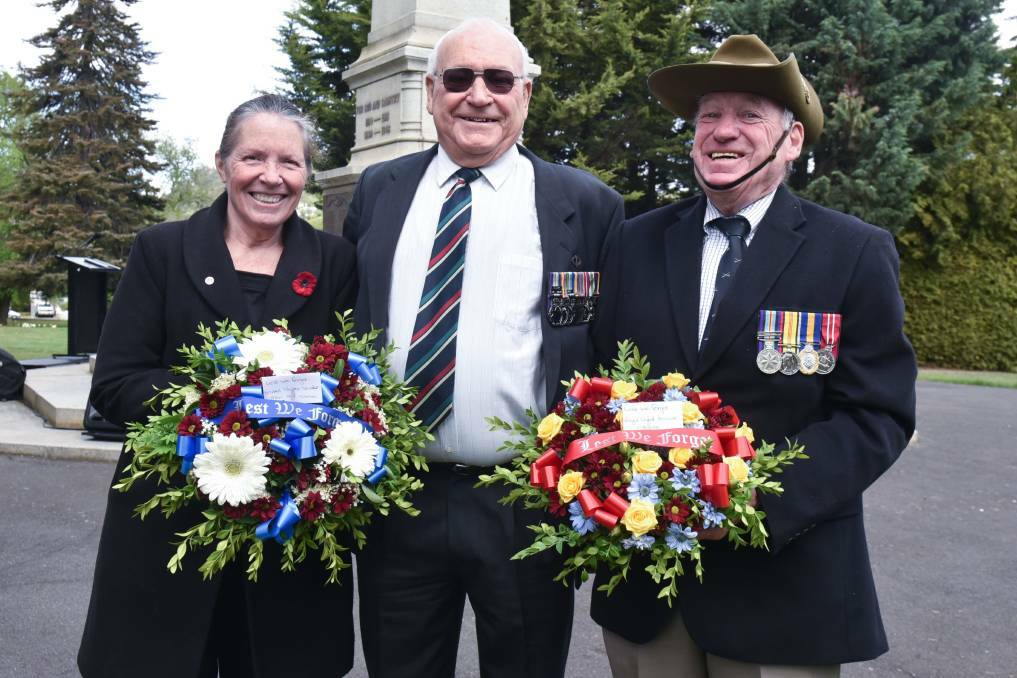 ABOVE: Katherine Williams, Bob Millwood and Kevin Best at last year's Remembrance Day service in Launceston. Picture: Neil Richardson