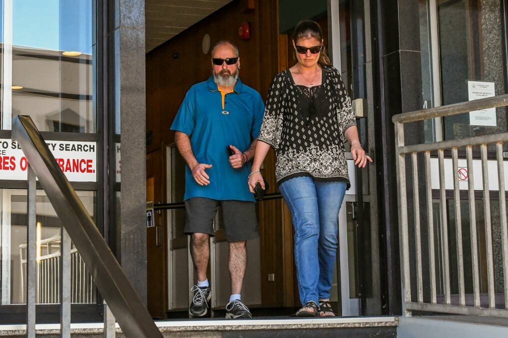 Trent Close and partner, Melissa, leaving the Launceston Magistrates Court on Monday following a decision over the death of traffic worker Terry Close in 2013. Picture: Phillip Biggs