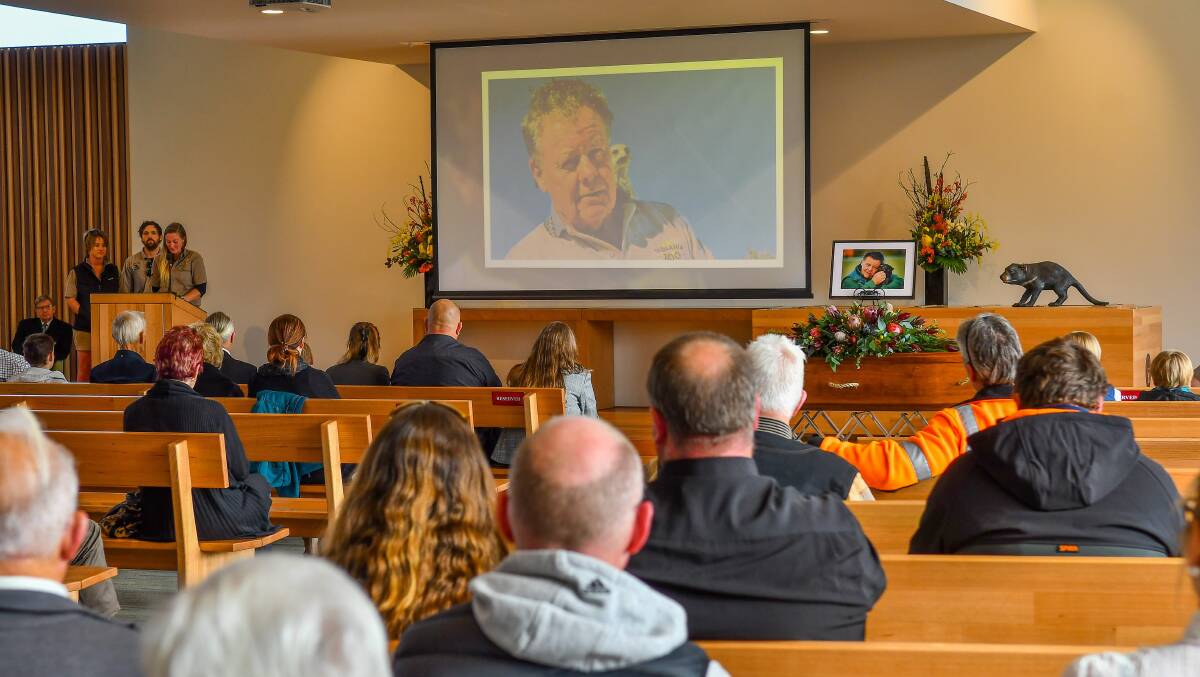 FINAL GOODBYE: Tasmania Zoo staff, family and friends farewell Richard "Dick" Warren after the zoo founder passed away last week. Picture: Scott Gelston

