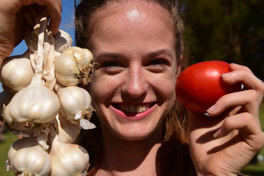 FRESH PRODUCE: Siobhan Brown travelled from Devonport to take part in the Tasmanian Garlic and Tomato Festival at Selbourne on Sunday. Picture: Paul Scambler