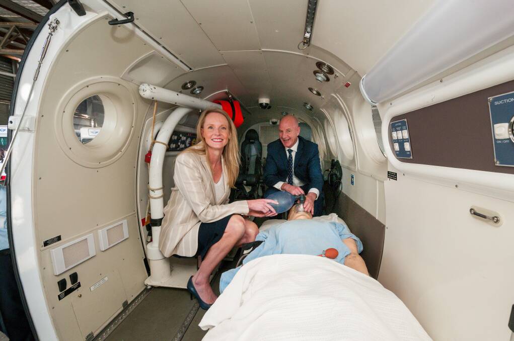 Health Minister Sarah Courtney and Premier Peter Gutwein showing their support for the Royal Flying Doctor Service. Picture: Phillip Biggs