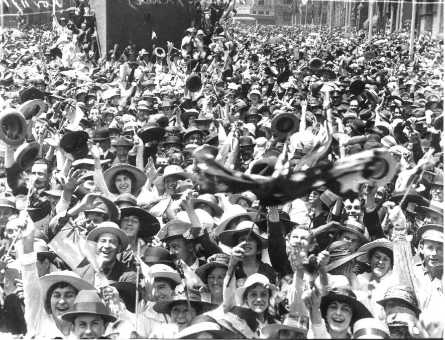 HISTORIC: Crowds celebrate on the first Armistice Day in Martin Place, Sydney on November 11, 1918. Picture: HH (Herbert) Fishwick. 