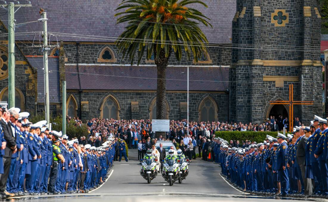 Hundreds of police formed a guard of honour at Senior Sergeant Paul Reynolds' funeral on Wednesday. Pictures: Scott Gelston
