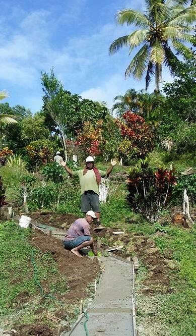 The volunteers work with local labourers during their visits to Fiji. Picture: Rotary Club of South Launceston Facebook
