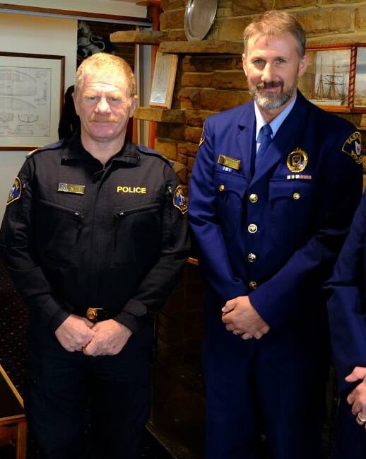 Sergeant Damian Bidgood and First Class Constable Nigel Housego at their award presentation. Picture: Rotary Tasmania