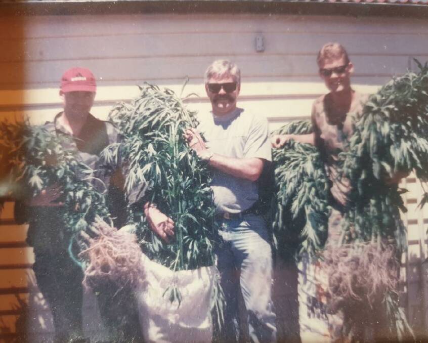 Constable Steve Greenwood (centre) with two other officers in the 90s after they uncovered about 80 cannabis plants. Picture: Supplied
