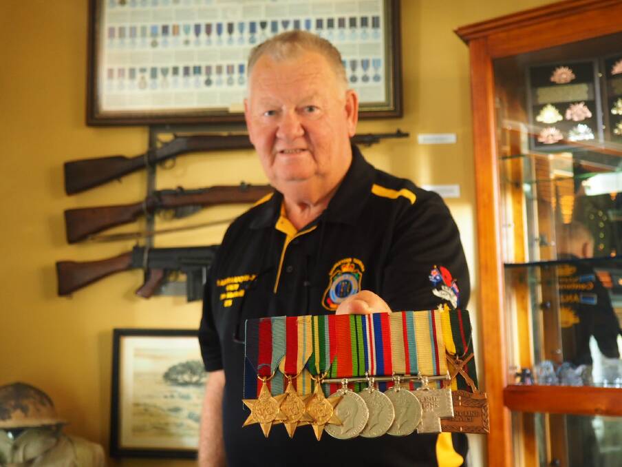 Don Mackrill with his father's war medals. Picture: Melissa Mobbs