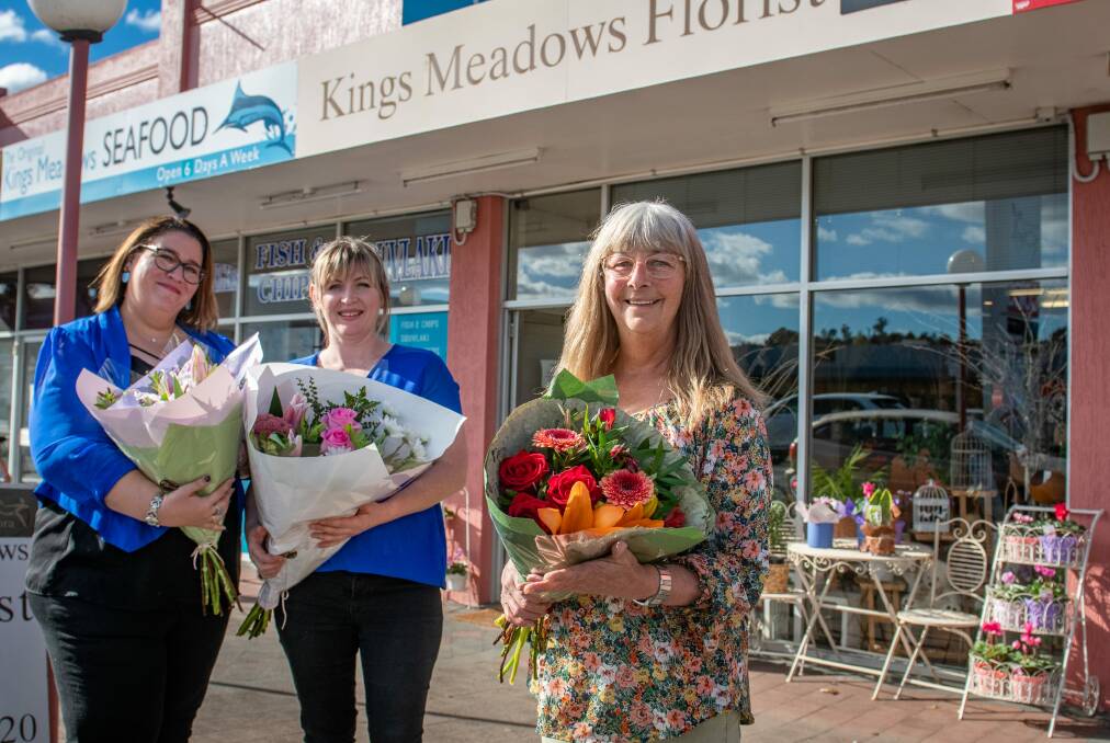 FLOWER GIRL: Liz Flaherty with new manager Faith Emmanuel and new owner Frances Herrick. Picture: Paul Scambler